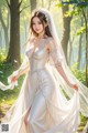 A woman in a wedding dress walking through a forest.